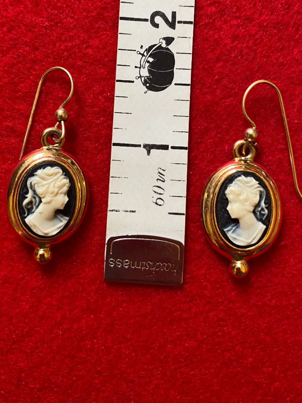 white on black background cameo earrings